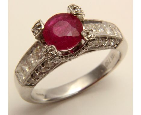 18ct White GoldRing set with Ruby 1.00 ct weight, with Diamond Shoulders 1.00 ct weight size O weight 5.7 grams
