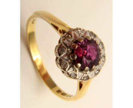 18ct Gold Ruby and Diamond Cluster Ring size N weight 3.3 grams. With Insurance Valuation. 