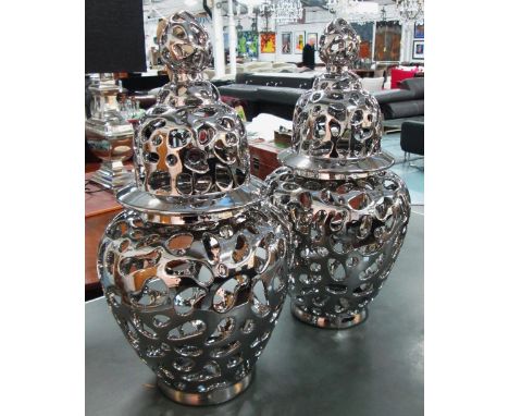 LIDDED VASES, a pair, pierced in ceramic chromed finish, 64cm H. (2)