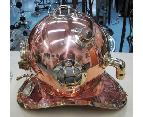 DIVERS HELMET, a reproduction, in a copper finish, 35cm H. (with faults)