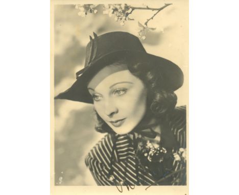 ACADEMY AWARD WINNERS: An excellent selection of three vintage signed photographs by three awarded Hollywood stars of the gol