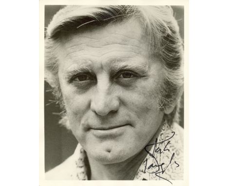 DOUGLAS &amp; DE HAVILLAND: Two good signed 8 x 10 photographs by Kirk Douglas (1916-2020) American Actor, awarded with the O