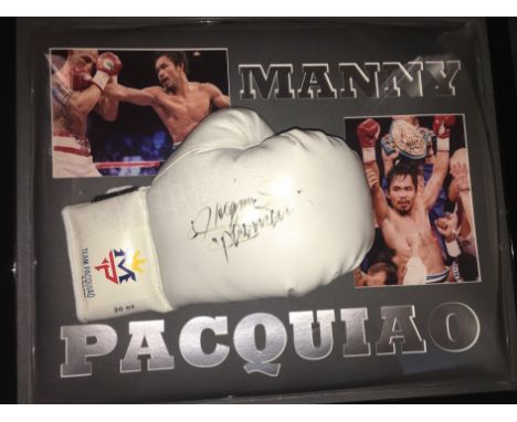 PACQUIAO MANNY: (1978- ) Filipino professional Boxer and Politician. Widely considered one of the greatest boxers of all time