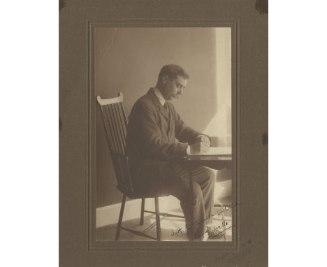 WELLS H. G.: (1866-1946) English Writer of Science Fiction novels. A good vintage signed sepia 8 x 10 photograph, the image d