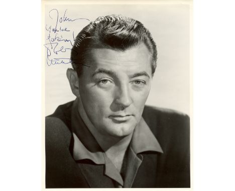 MITCHUM ROBERT: (1917-1997) American Actor. A good vintage signed and inscribed 8 x 10 photograph of the actor in a head and 