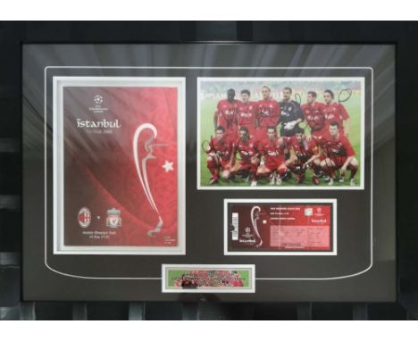 LIVERPOOL FC: A multiple signed colour 11.5 x 7.5 photograph by all eleven members of the Liverpool FC team who won the 2005 