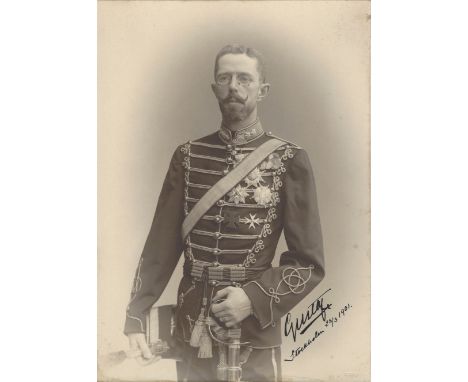 GUSTAV V: (1858-1950) King of Sweden 1907-50. A fine vintage signed sepia 6 x 9 photograph depicting the Crown Prince standin