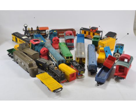 An interesting group of larger scale Railway Toys including Timpo, Thomas the Tank Engine (Ertl), Fisher Price and others. Lo