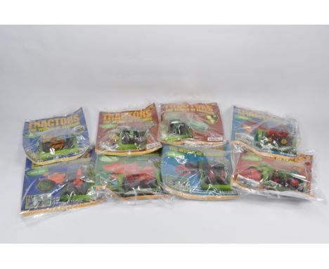 8 x Tractors and the World of Farming sealed with Hatchette Tractor Models in 1/43 Scale made by Universal Hobbies. (8)