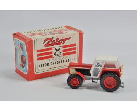 Igra Small Scale Plastic Zetor Crystal 12045 Tractor. Lacks Exhaust. Good in Fair to Good box. Rare.