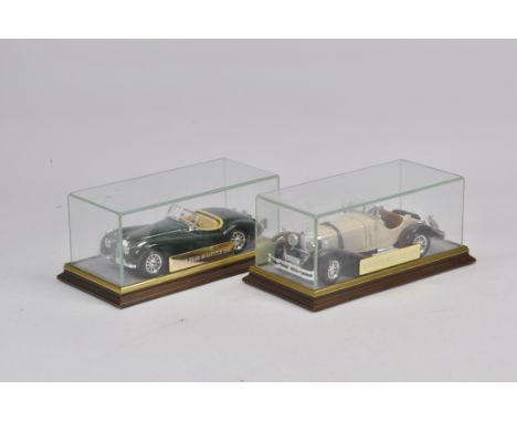 Finely displayed duo of Burago Large Scale Classic Cars. Jaguar and Mercedes. Mint. (2)