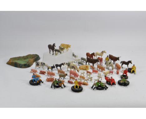 Large Selection of Plastic Animal Figures and Tractor Drivers from Various Makers including Britains. Cows, Sheep and others.