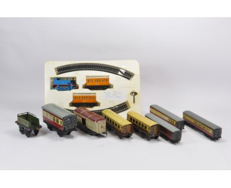 Group of Railway Rolling stock and a Clockwork Thomas the Tank Engine Set. Untested. (10)