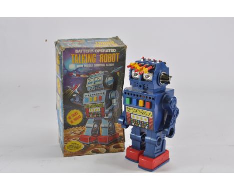 Japanese Tin and Plastic Battery Operated "Talking Robot" with missile shooting and walking action. Untested but Very Good to
