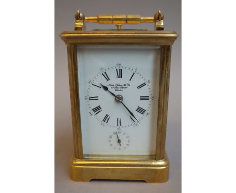 A French brass cased grande sonnerie carriage clock, late 19th century (later enamel dial), with two train movement and sonne