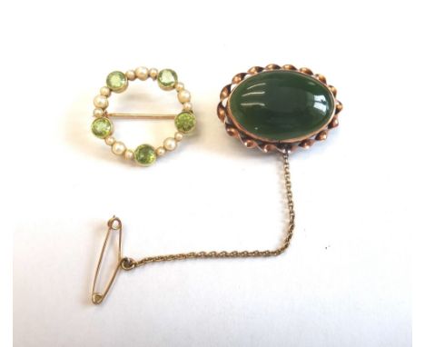 A gold, peridot and seed pearl brooch, of shaped circular form, collet set with five circular cut peridots, alternating with 