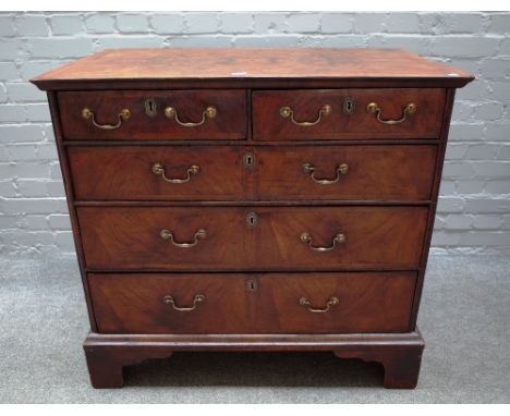 A George III and later figured walnut chest with two short and three long graduated drawers on bracket feet, 93cm wide x 87cm