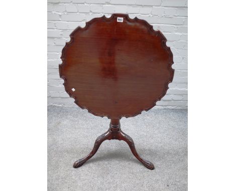 An 18th century mahogany occasional table, the pie crust snap top on carved tripod base, 71cm wide x 72cm high. 