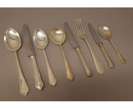 A silver table service of flatware, comprising; six tablespoons, eight soup spoons, eight dessert spoons, eight fruit spoons,
