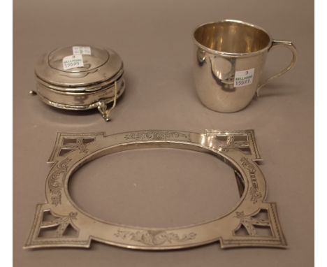 Silver and silver mounted wares, comprising; a shaped rectangular photograph frame, with pierced and engraved decoration, Bir