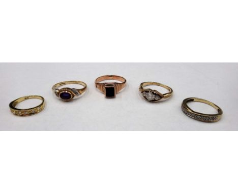 A gold ring, mounted with a row of seven circular cut diamonds, a gold and diamond set half hoop ring, a 9ct gold, amethyst a