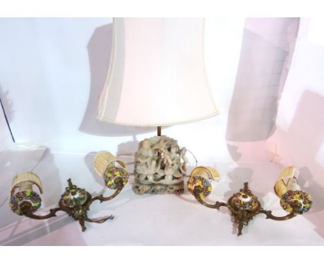 Lighting, comprising; a Chinese carved softstone lamp base and a pair of porcelain mounted wall lights, (3).  S3B