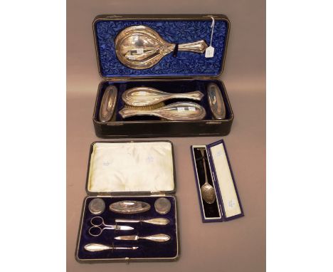 Silver and silver mounted wares, comprising; a lady's five piece dressing set, consisting of a hand mirror, a pair of hair br