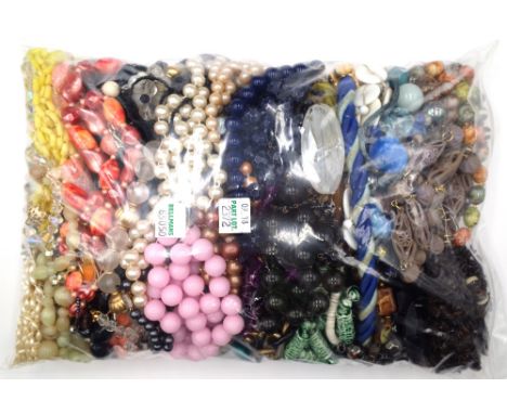 A large collection of mostly costume jewellery, including bead and other necklaces, bangles, earrings, rings, collectables, c