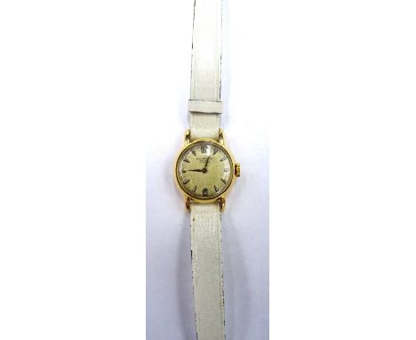 An International Watch Company Schaffhausen gold circular cased lady's wristwatch, circa 1950, with a signed jewelled lever m