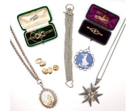 A 9ct gold, sapphire and seed pearl bar brooch, Chester 1912, with a case, a 15ct gold, peridot and seed pearl bar brooch, Ch