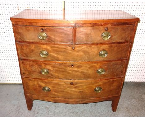 A George III mahogany bowfront chest of two short and three long graduated drawers on bracket feet, 100cm wide x 103cm high. 