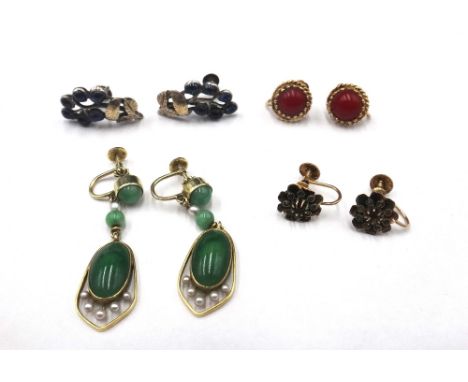 A pair of gold and coral earrings, detailed 14 K, a pair of gold, seed pearl and green gem set pendant earrings and two furth