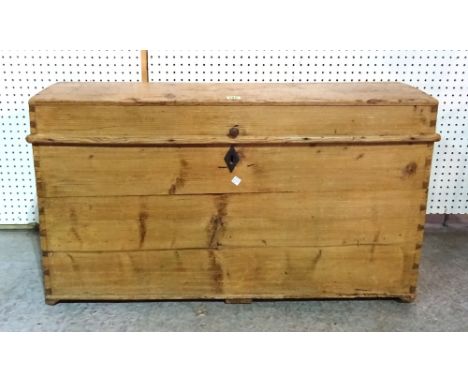 An early 20th century pine dome top trunk, 96cm wide x 58cm tall.  I8