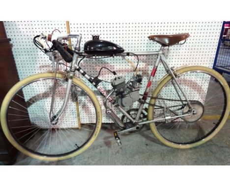 A 20th century Dawes bicycle fitted with a 2 stroke petrol engine, approximately 49cm  H5.