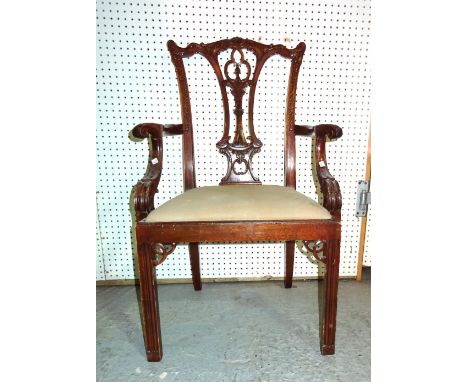 A 20th century Chippendale style mahogany open armchair on reeded supports.  F4