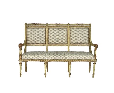 A French 18th century style parcel gilt cream painted open arm sofa, with eagle head finials, on spiral fluted supports, 154c