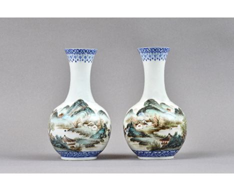 A pair of Chinese porcelain bottle vases, 20th century, possibly Republican, each painted with an extensive landscape between