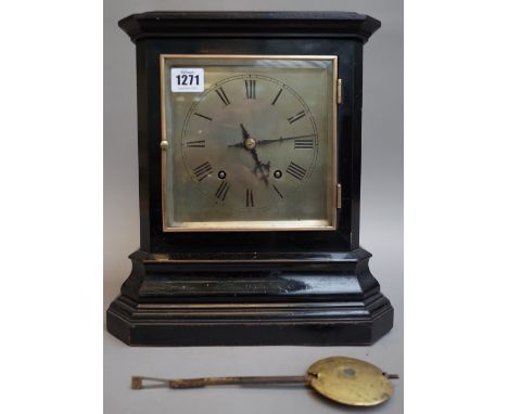 A German ebonised mantel clock, late 19th century, the silvered dial in an ebonised case of canted rectangular form enclosing