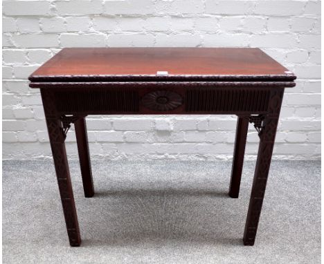 A George III mahogany rectangular mahogany concertina action card table in the Chinese Chippendale manner, with blind fret de