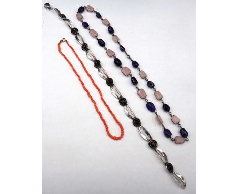 A Danish silver and tiger's eye collar necklace, in a curved and pierced link design, on a hook shaped clasp, detailed N .E. 