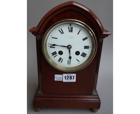 A French mahogany cased mantel clock, early 20th century, with arch top and white enamel dial detailed 'Mappin & Webb London'