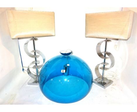 Lighting, including; a blue perspex dome ceiling light, 51cm diameter and two polished metal lamps with shades, (3).   S1T