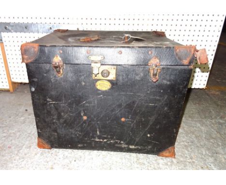 An early 20th century canvas travelling trunk and a quantity of toy train track including some trains.  S4B