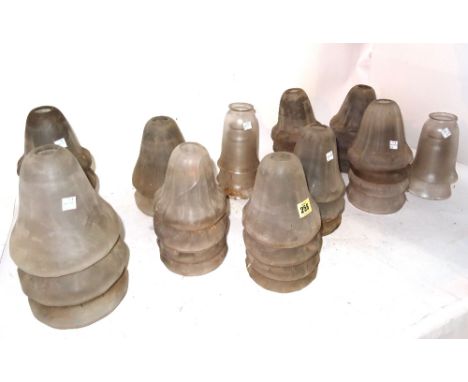 A large quantity of mostly 20th century frosted glass lamp shades of varying sizes, (qty).  S2B