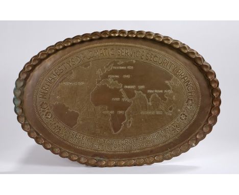 Oval brass tray, embossed "HER MAJESTY'S DIPLOMATIC SERVICE SECURITY BRANCH, PRESENTED TO GEORGE. R. WHITE ON HIS RETIREMENT 