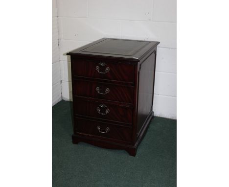 Mahogany veneered filing cabinet, with tooled green leatherette inset top above two drawers, on bracket feet, 54cm wide