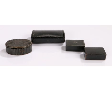 Four snuff boxes to include a papier mache snuff box of rectangular form, 8.5cm wide, a papier mache snuff box, 4.5cm wide, a