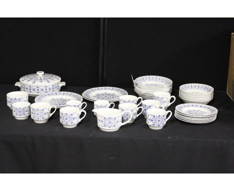 Midwinter Valencia pattern dinner and tea service, consisting of seven teacups, two coffee cups, small and large sugar bowls,