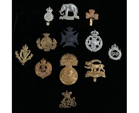 British Army cap badges from different periods, Army Pay Corps, Royal Engineers, Royal  Scots Fusiliers, 19th Hussars, 24th L