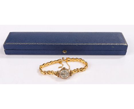 Eterna 9 carat gold ladies wristwatch, the signed silvered dial with baton numerals, manual wound, the case 16.8mm diamater, 